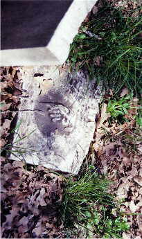 Top of broken stone of W. C. Wallace