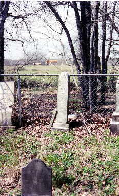 W. C., John, and Sarah Wallace tombstones