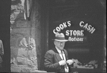Eben Cook in front of his store (Cook's Cash Store)