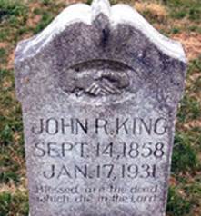 John R King