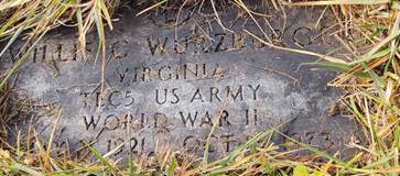 A stone with engraved text on it
AI-generated content may be incorrect.