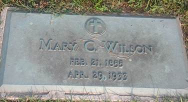 A grave stone with a cross and a cross on it

AI-generated content may be incorrect.