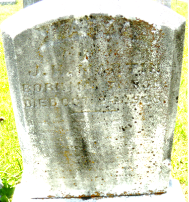 A close-up of a tombstone

AI-generated content may be incorrect.