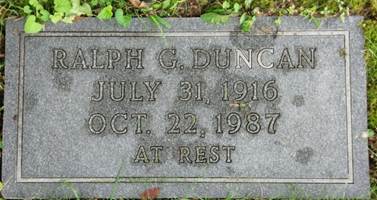 A grey stone with text on it

AI-generated content may be incorrect.