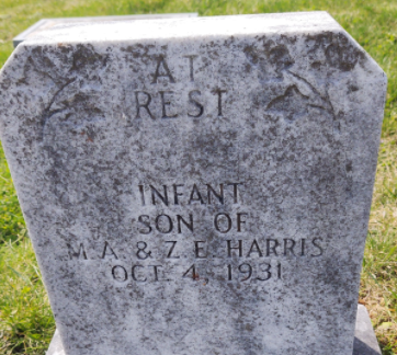 A tombstone with text on it
AI-generated content may be incorrect.