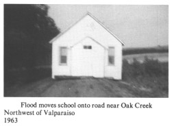 Flood moves school onto road