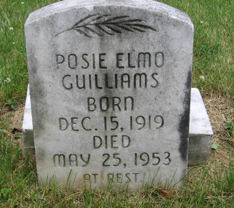 A tombstone in a grassy area

Description automatically generated with medium confidence