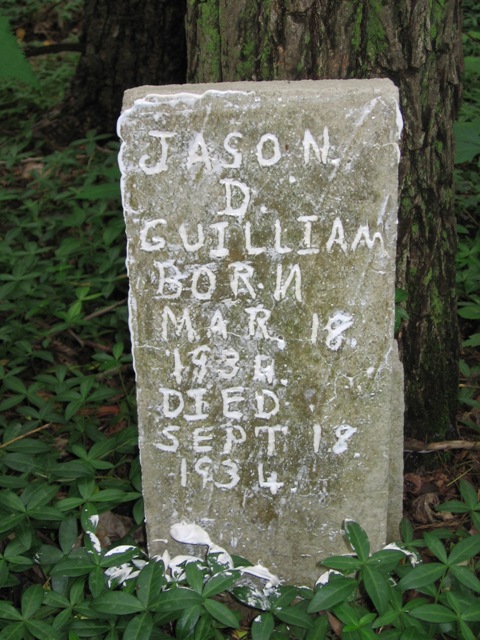 A tombstone with writing on it

Description automatically generated with medium confidence