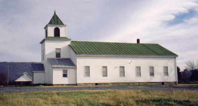 Cedar Grove Church of the Brethren, located directly across Route 11 (the Valley Pike) from the cemetery.