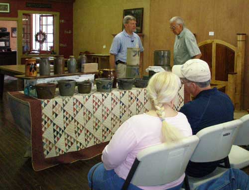 John Adamson speaking with spectator